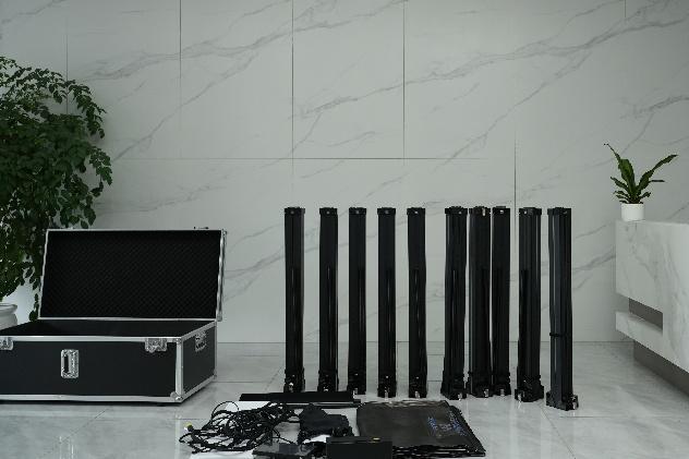 Booth columns, cameras and flight case laid out for transport