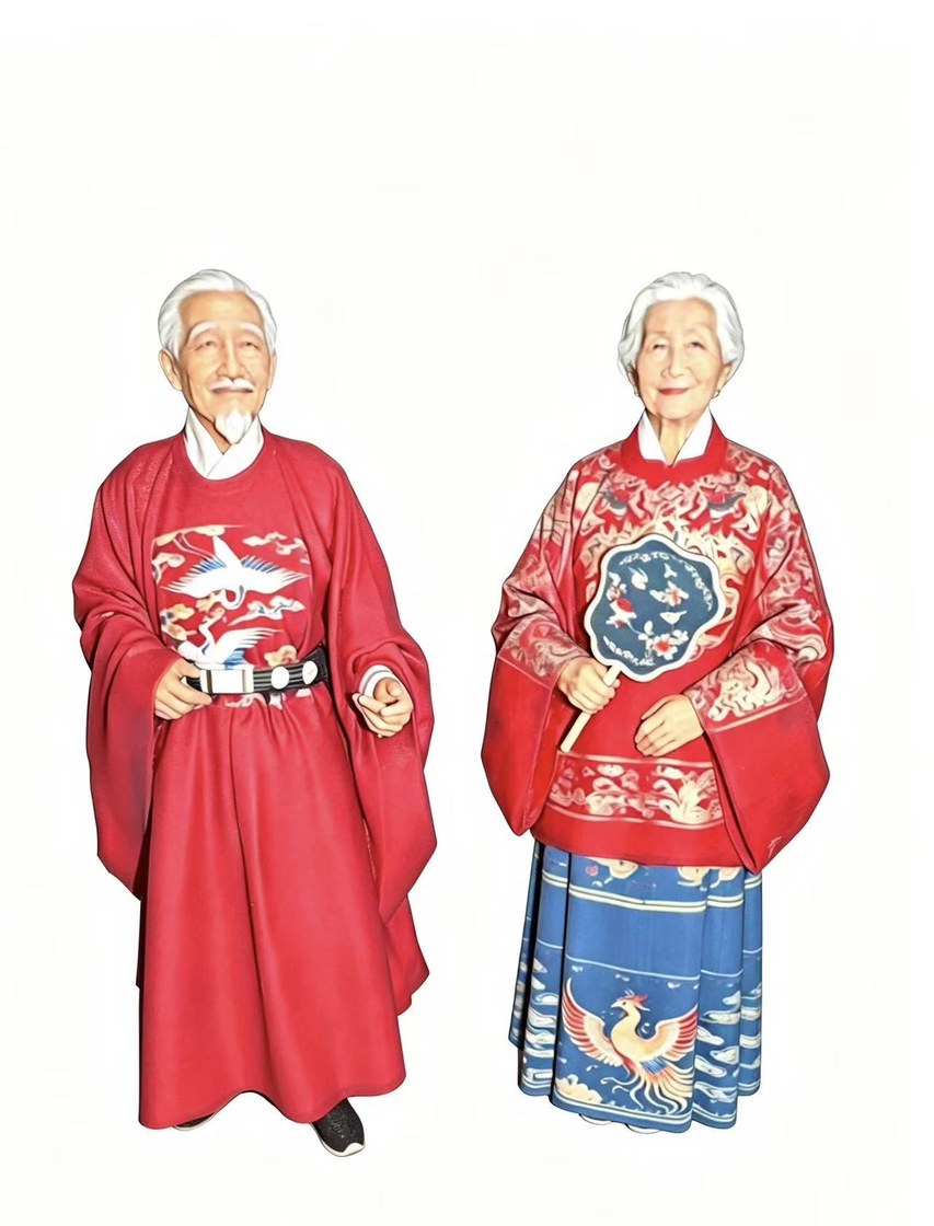 3D-printed figurines of an elderly couple wearing traditional red Chinese wedding attire